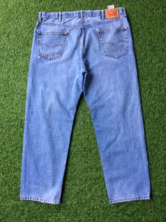 Size 42 Vintage Distressed Levis 550