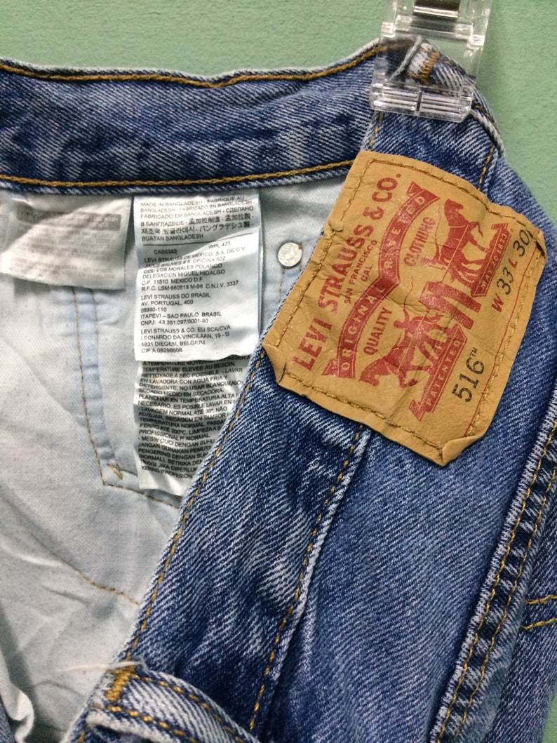 W31 L28 Vintage Distressed Levis 516 Jeans Light Wash Rigid Denim ...