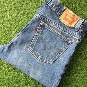 Size 31 Vintage Distressed Levis 550 Jeans W31 L33 Light Wash Rigid Denim Classic Relaxed Fit Tapered Leg Tall Jeans Waist 31&quot;