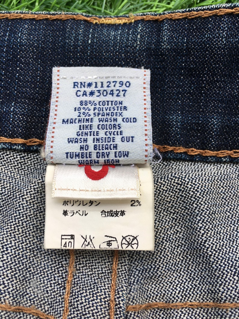 May include: A set of three ceramic mugs with a speckled, matte finish. The mugs are in shades of cream, light gray, and dark gray. Each mug has a simple, minimalist design, perfect for coffee or tea.