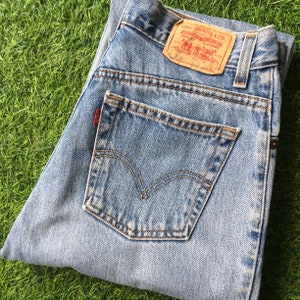 Size 28 Vintage Levis 550 Altered Reworked Light Wash Distressed Ripped Slim Fit Tapered Leg Levis Jeans Waist 28&quot;