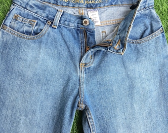 Vaqueros Arizona Y2K, corte bota de tiro bajo, cintura de 26 pulgadas, acampanados de mezclilla