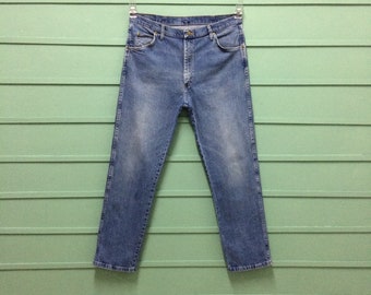 Vintage Wrangler-westernjeans uit de jaren 90: distressed hoge taille, maat 37