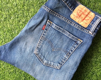 Vintage Distressed Levis Stretch Jeans, Faded Denim (W34 L32)