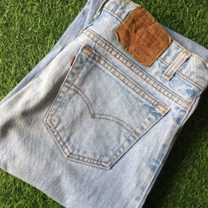 Size 34 Vintage Distressed Levis 550 Jeans W34 L32 Light Wash Rigid Denim Classic Relaxed Fit Tapered Leg Jeans Made In USA, Waist 34&quot;
