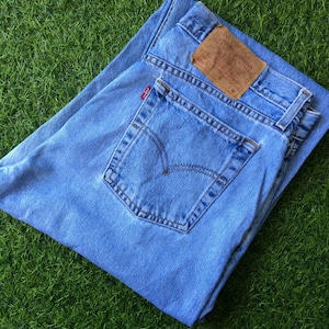 Size 33 Vintage Distressed Levis 560 Jeans W33 L31 Light Wash Rigid Denim Classic Loose Fit Tapered Leg Jeans Mom Jeans Waist 33"