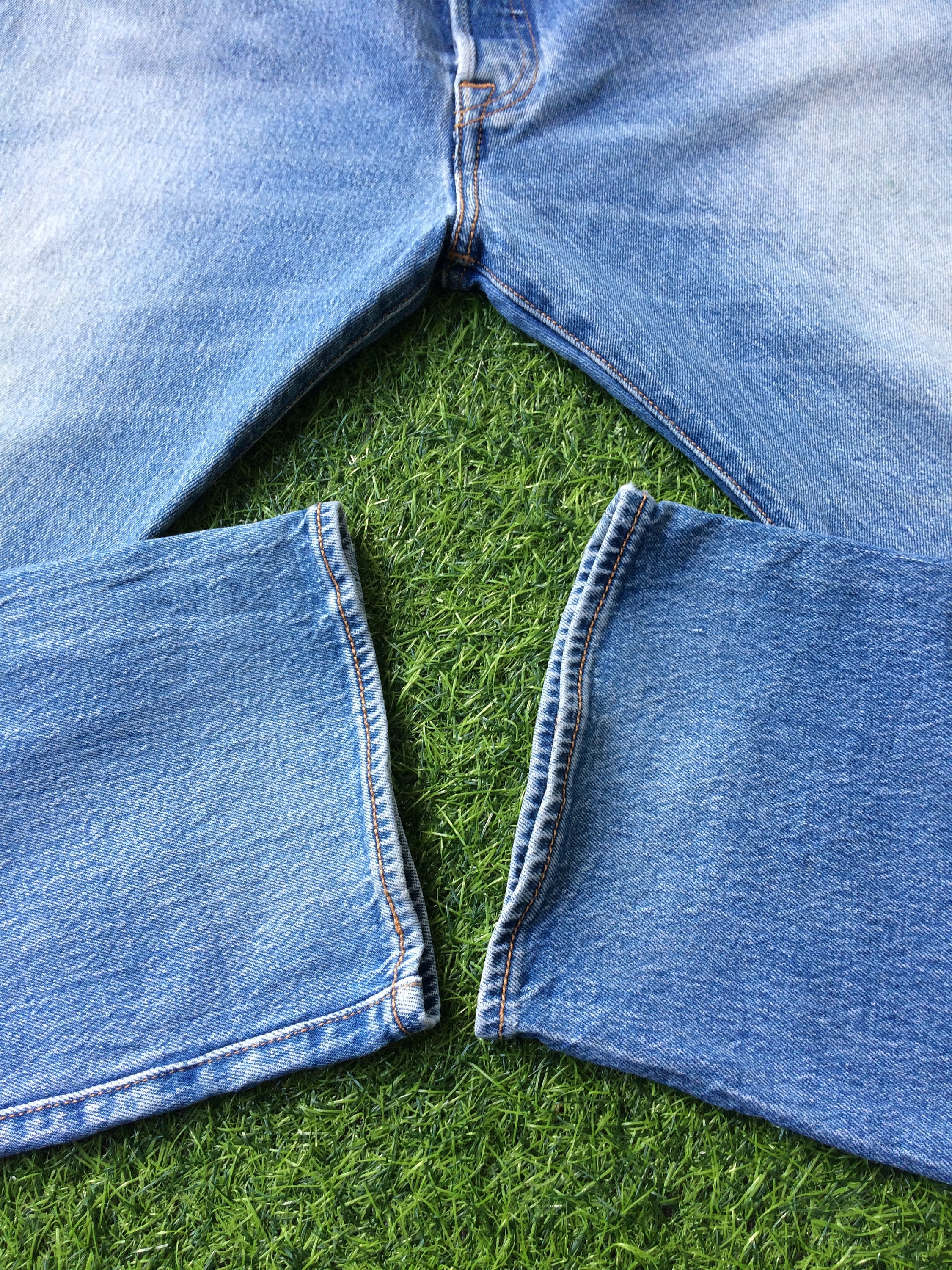 Vintage Levis 501 Jeans: Size 38 Distressed Light Wash Stretch 