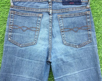 Vaqueros acampanados de tiro bajo estilo vintage L.E.I Y2K, cintura de 25 pulgadas.