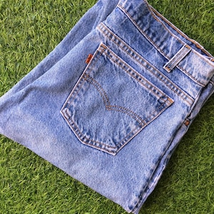 Size 35 Vintage Distressed Levis 550 Plus Size W35 L29 Light Wash Jeans Orange Tab Rigid Denim Waist 35"