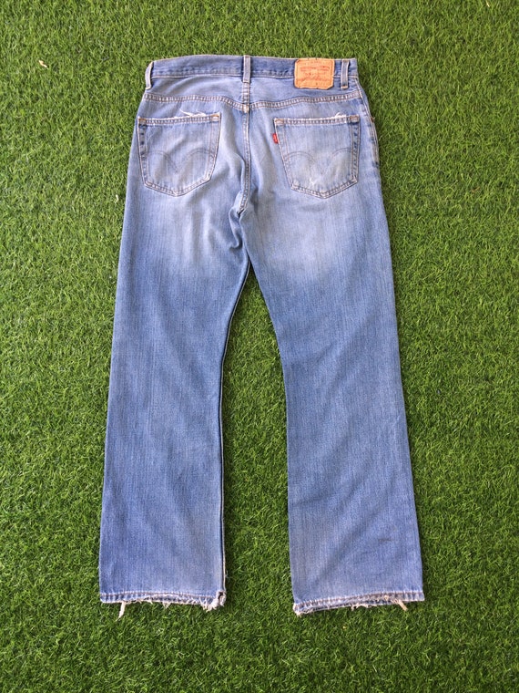 Size 33 Vintage Distressed Levis 557 Relaxed Bootcut Jeans - Etsy