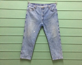 Vintage Wrangler-jeans W42 L30: distressed westerndenim