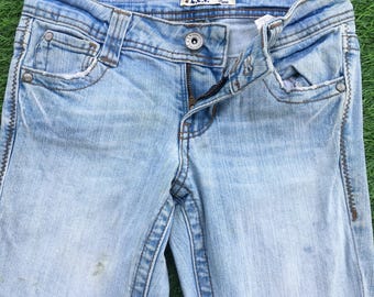 Vaqueros Y2K L.e.i de tiro bajo y corte bota, denim desgastado (W24 L32)