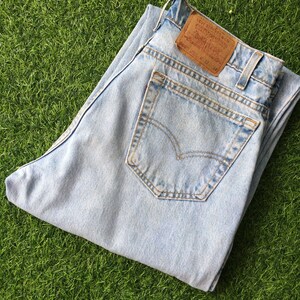 Size 32 Vintage Distressed Levis 560 Jeans W32 L31 Light Wash Denim Jeans Loose Fit Tapered Leg Jeans Waist 32"
