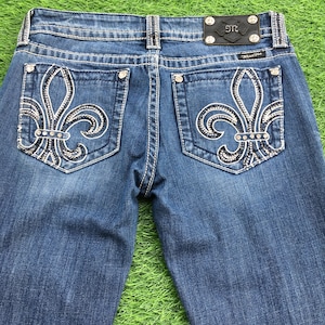 Miss Me Flu Dee Lee medium blue wash 2000’s grunge style low-rise embellished embroidered signature rise boot jeans