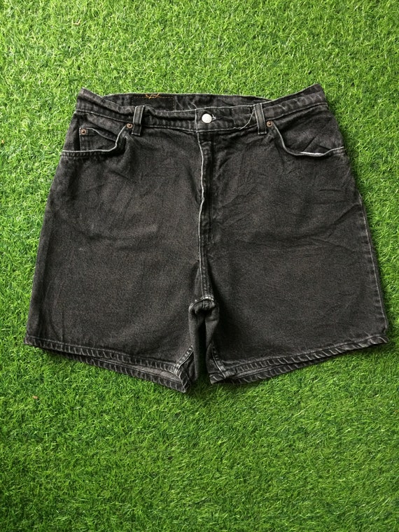 Distressed black shorts online