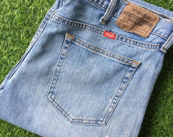 Vintage Y2K Wrangler Jeans, Size 35 Light Wash Distressed Denim