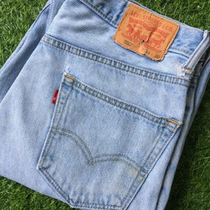 Size 32 Vintage Distressed Levis 550 Dirty Jeans W32 L28 Light Wash Denim Relaxed Fit Jeans Made In Lesotho Waist 32&quot;