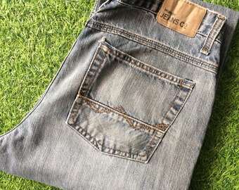 Vaqueros Wrangler de corte bota vintage, talla 31, denim desgastado