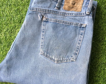 Vintage Wrangler-jeans, maat 36, distressed western-cowboydenim