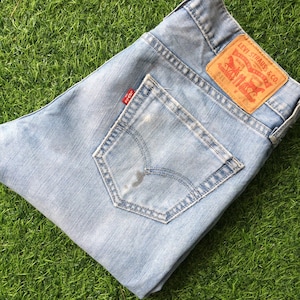 Size 31 Vintage Levi&#39;s 511 Mid Waist Slim Fit Jeans Y2Ks Light Wash Denim Tapered Leg Modern Jeans - Large, 31&quot;