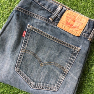 W41 L27 Jeans Levis 505 vintage invecchiati Jeans a gamba dritta in denim lavaggio medio. Levi taglia grande 41x27