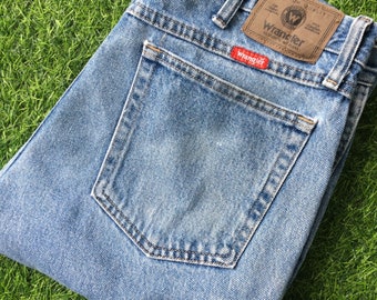 Jeansy Wrangler Western w stylu vintage, jasno sprane, z przetarciami (W33 L32)