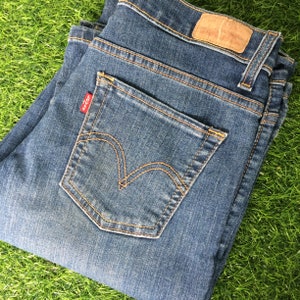 Calça jeans Levi's 512 flare desgastada, cintura média, tamanho 27 (cintura) x 33 (comprimento)