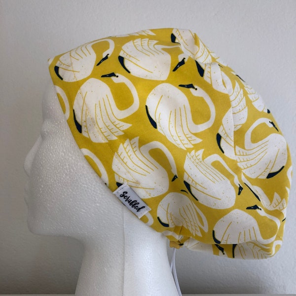 Swans on yellow elastic scrub hat