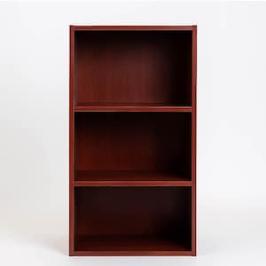 May include: A three-shelf bookcase made of dark cherry-colored wood. The bookcase has a rectangular shape with a closed back and sides. The shelves are evenly spaced, creating three storage compartments. The wood grain is visible, adding texture to the piece.