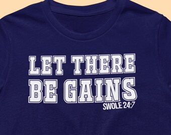 May include: A navy blue t-shirt with white text that reads "Let There Be Gains" and "Swole 24/7".