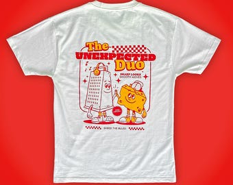 Funny Cheesy Pun Shirt, Retro Cheese Grater Graphic Tee, Soft Vintage Style T-Shirt, Corny Jokes Gift, Cheddar Together, Silly Foodie Top
