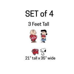 Op de afbeelding: Een set van vier Valentijnsdagdecoraties met stripfiguren. De set bevat Charlie Brown met een hart, Lucy met een hart, een rode wagen met harten en Snoopy. De set is 91 cm hoog, de wagen en Snoopy meten 53 cm hoog x 89 cm breed.