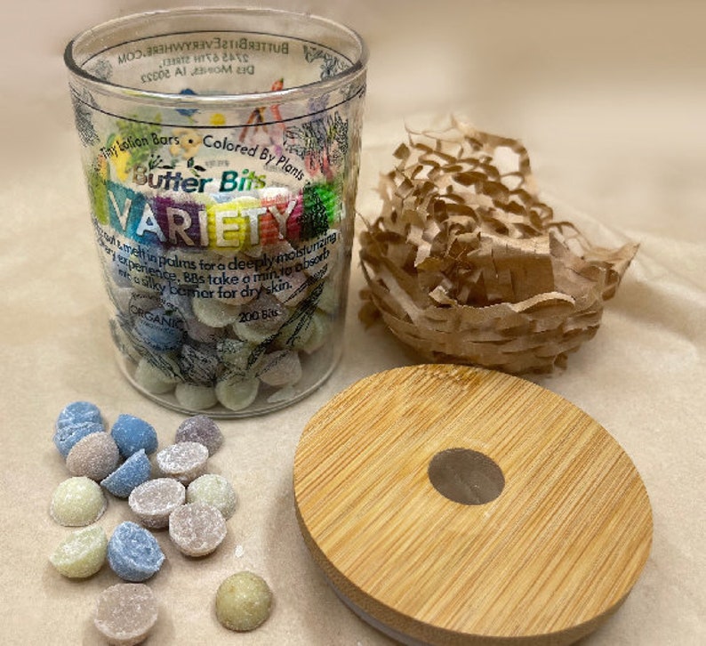 organic lotion bars with essential oils for dry cracked ashy skin in reusable eco-friendly sustainable jars with bamboo cover