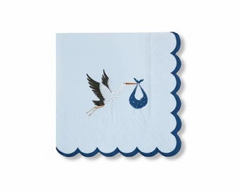 May include: A square paper napkin in light blue with a scalloped dark blue edge. The center features an illustration of a white stork with black-tipped wings carrying a dark blue bundle with white polka dots in its orange beak.