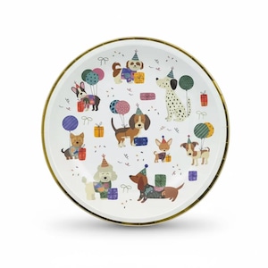 May include: A white, round party plate with a gold rim, decorated with cartoon dogs wearing party hats and holding balloons and gifts. The dogs are in various poses and colors, creating a festive and celebratory design.
