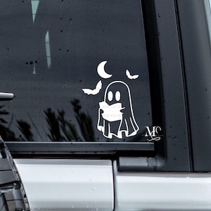 ghost reading vinyl decal sticker. cute spooky sticker. book lover car decal sticker. trending vinyl decal sticker. ghost and bats sticker decal. cute car accessories