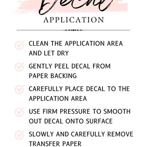 May include: A pink and white graphic with a black handwritten word "Decal" and the text "APPLICATION" in black. A checklist with five steps for applying a decal is shown with checkmarks next to each step. The steps are: Clean the application area and let dry, Gently peel decal from paper backing, Carefully place decal to the application area, Use firm pressure to smooth out decal onto surface, Slowly and carefully remove transfer paper. The text "MODERN EDGE DESIGNS" is at the bottom of the graphic.
