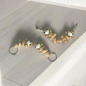 Mini Otters - Adorable Fidget Toy Keychains 3D printed backpack keychain accessory