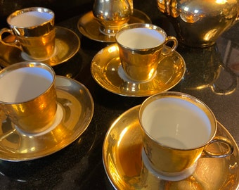 Antique gold overlay porcelain tea set