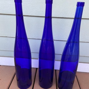 Vintage 19” cobalt blue Italian wine bottles