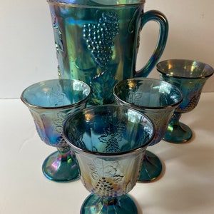 Carnival glass pitcher set