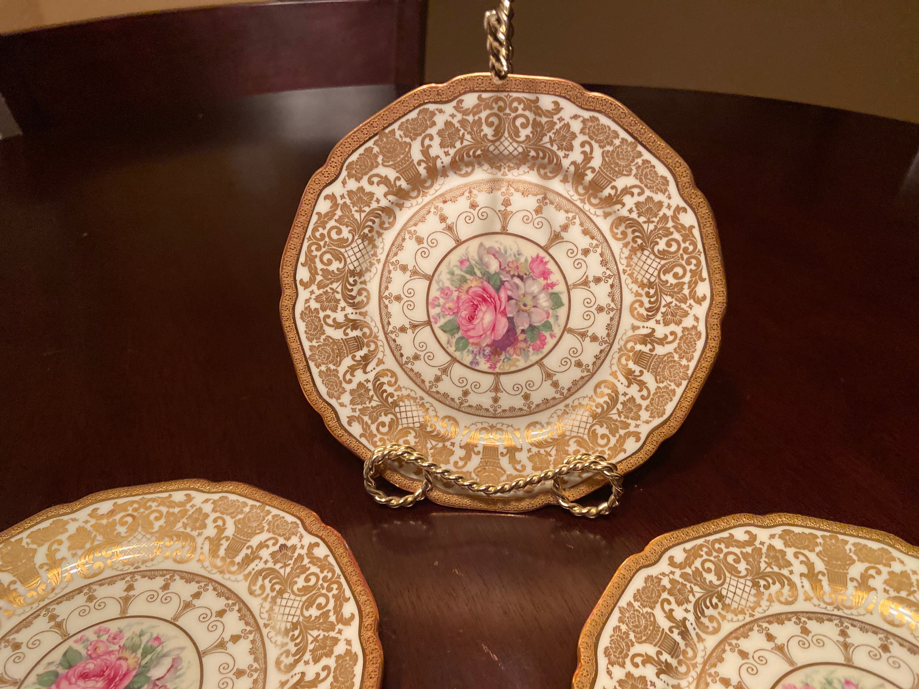 4 Rosethal ivory numbered bread and butter plates