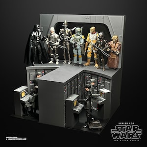 May include: A Star Wars themed diorama featuring a variety of characters from the franchise, including Darth Vader, Boba Fett, and a Stormtrooper. The diorama is made of black and gray plastic and features a detailed interior with computer consoles and other props. The diorama is scaled for the Star Wars Black Series action figures.