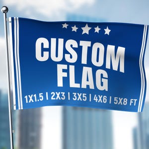 May include: A blue rectangular flag attached to a silver pole, featuring the white text CUSTOM FLAG and five white stars at the top. Below the text, the flag displays the dimensions 1X1.5 | 2X3 | 3X5 | 4X6 | 5X8 FT in white lettering.