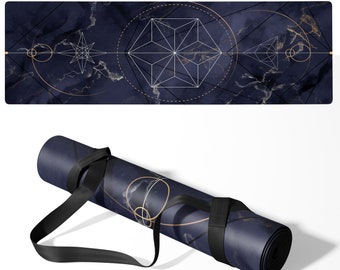 May include: A navy blue yoga mat with a geometric pattern and gold accents. The mat is rolled up and secured with a black strap.