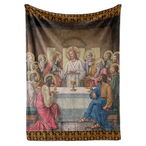 May include: A tapestry depicting the Last Supper, a Christian religious scene. Jesus Christ is seated at a table with his disciples, sharing a meal. The tapestry is framed with a gold and black border.