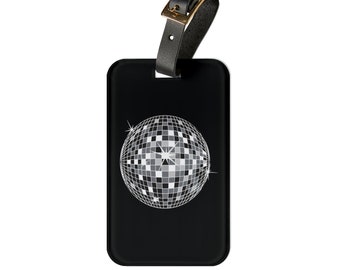 Retro meets glam with our 1970 Disco Ball Luggage Tags Stand out & add sparkle to your travel with these eye-catching handmade tags Shop now