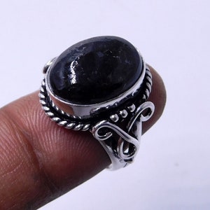 Raw Nuumite Sterling Silver Ring: Oval Greenland Stone