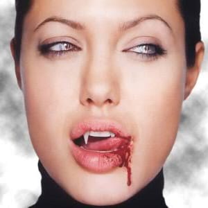 May include: A close-up of a woman's face with red lipstick and fake fangs. Blood is dripping from her mouth.