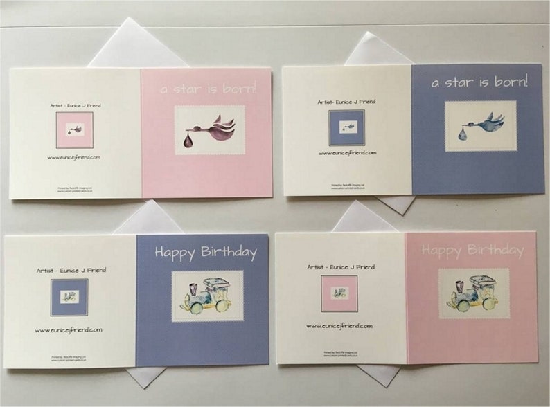 May include: Four greeting cards with envelopes. Two cards feature a stork carrying a baby with the text "a star is born!" One card is pink and the other is blue. The other two cards feature a train with the text "Happy Birthday". One card is blue and the other is pink.